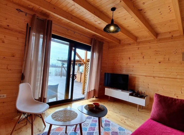 Wooden house with three separate apartments on riverbank in Ada Bojana, 115 m²