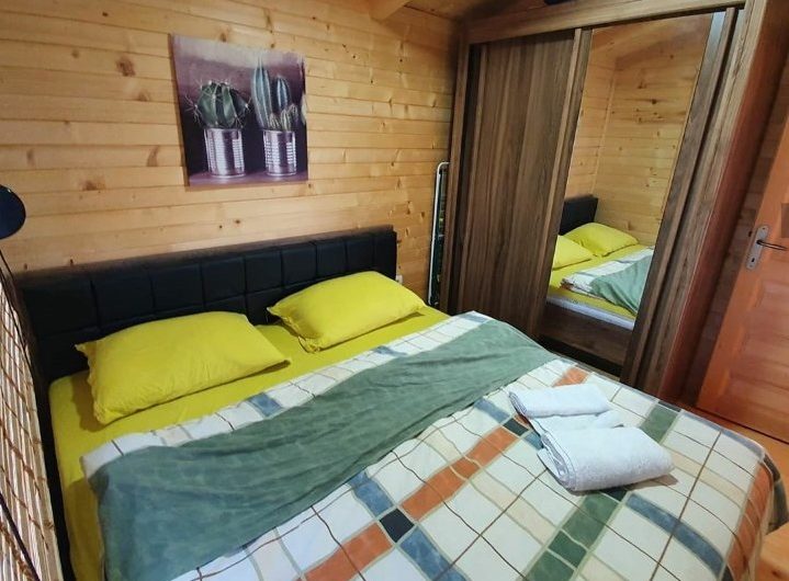 Wooden house with three separate apartments on riverbank in Ada Bojana, 115 m²