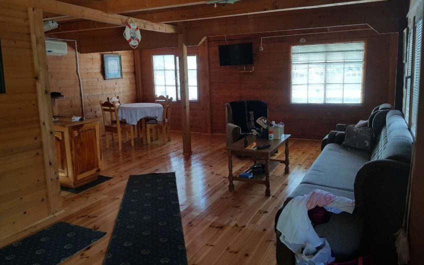 Two-storey wooden cottage on river in Ada Bojana, 110 m²