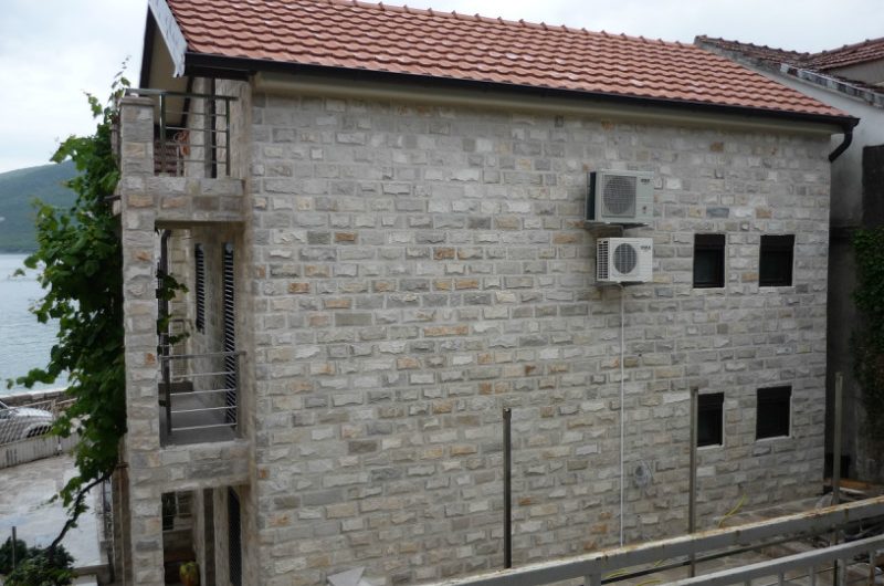 Renovated old three-storey stone house on first line in Đenovići, 100 m²