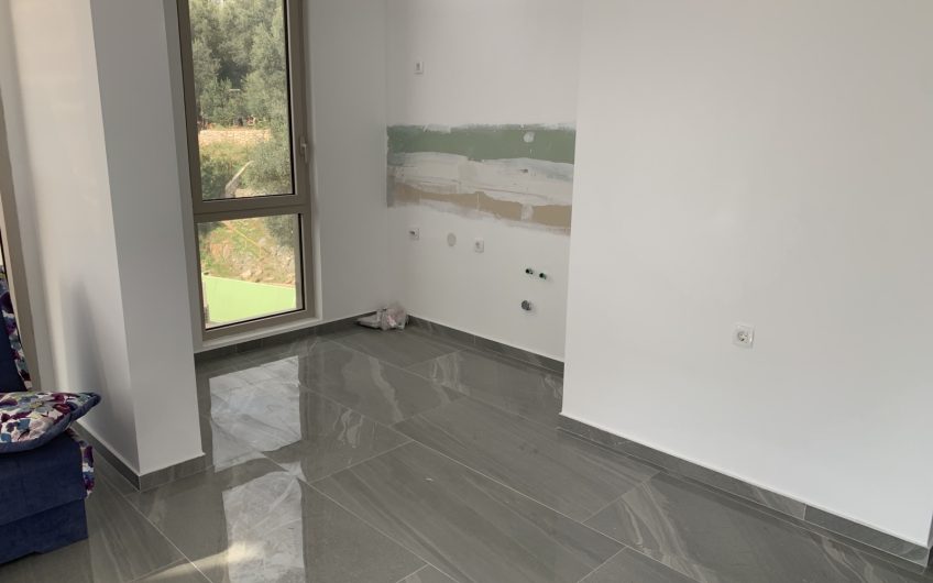 Two-bedroom apartment with sea view and pool in Rafailovići, 67 m²