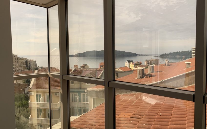 Two-bedroom apartment with sea view and pool in Rafailovići, 67 m²