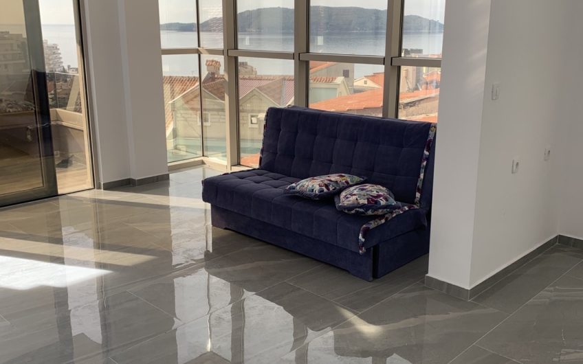 Two-bedroom apartment with sea view and pool in Rafailovići, 67 m²
