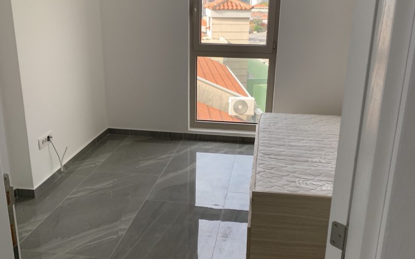 Two-bedroom apartment with sea view and pool in Rafailovići, 67 m²