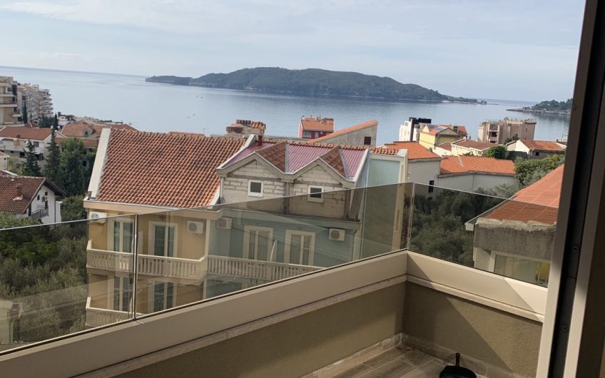 Two-bedroom apartment with sea view and pool in Rafailovići, 67 m²