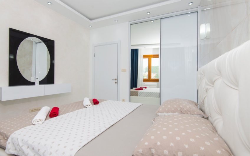 Luxury two-bedroom apartment near sea in Rafailovići, 85 m²