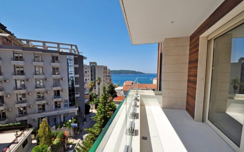 New spacious two-bedroom apartment on coast in Rafailovići, 73 m²