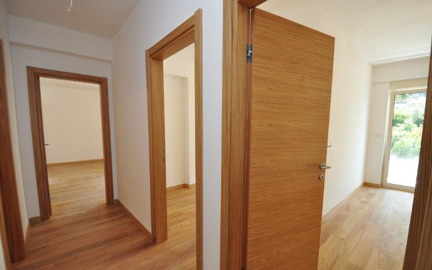 New large three-bedroom apartment near beach with seaview in Rafailovići, 121 m²