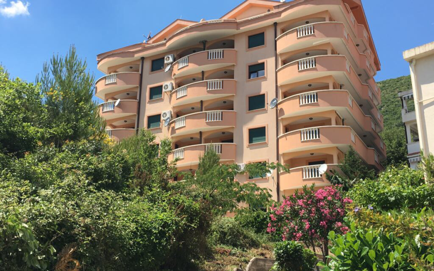 Unique two-bedroom apartment with green patio not far from sea in Petrovac, 57 m²