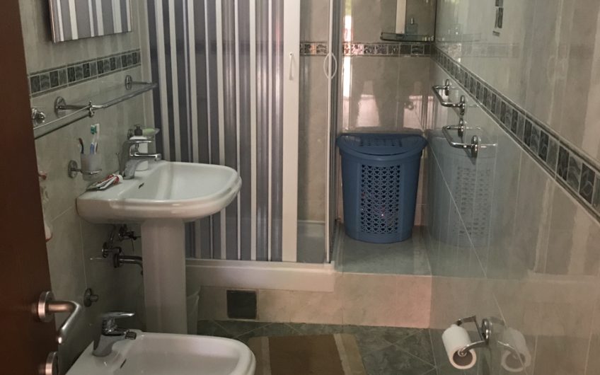 Unique two-bedroom apartment with green patio not far from sea in Petrovac, 57 m²